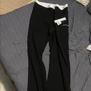 Bebe Black and White Athletic Pants..Bebe on the side ..these are so classy